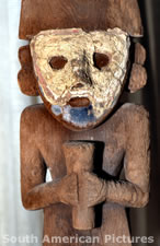 pge0069 wooden figure with mud plaster face mask